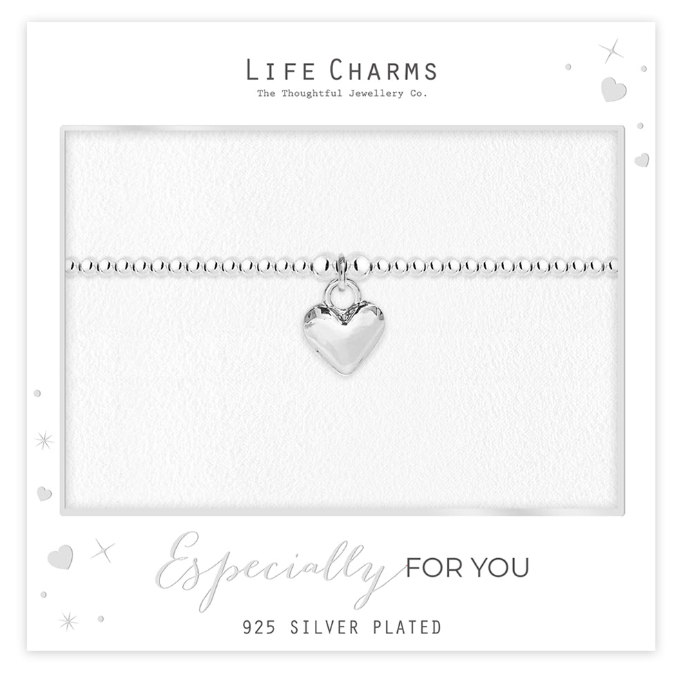 Polished puffed heart bracelet in silver