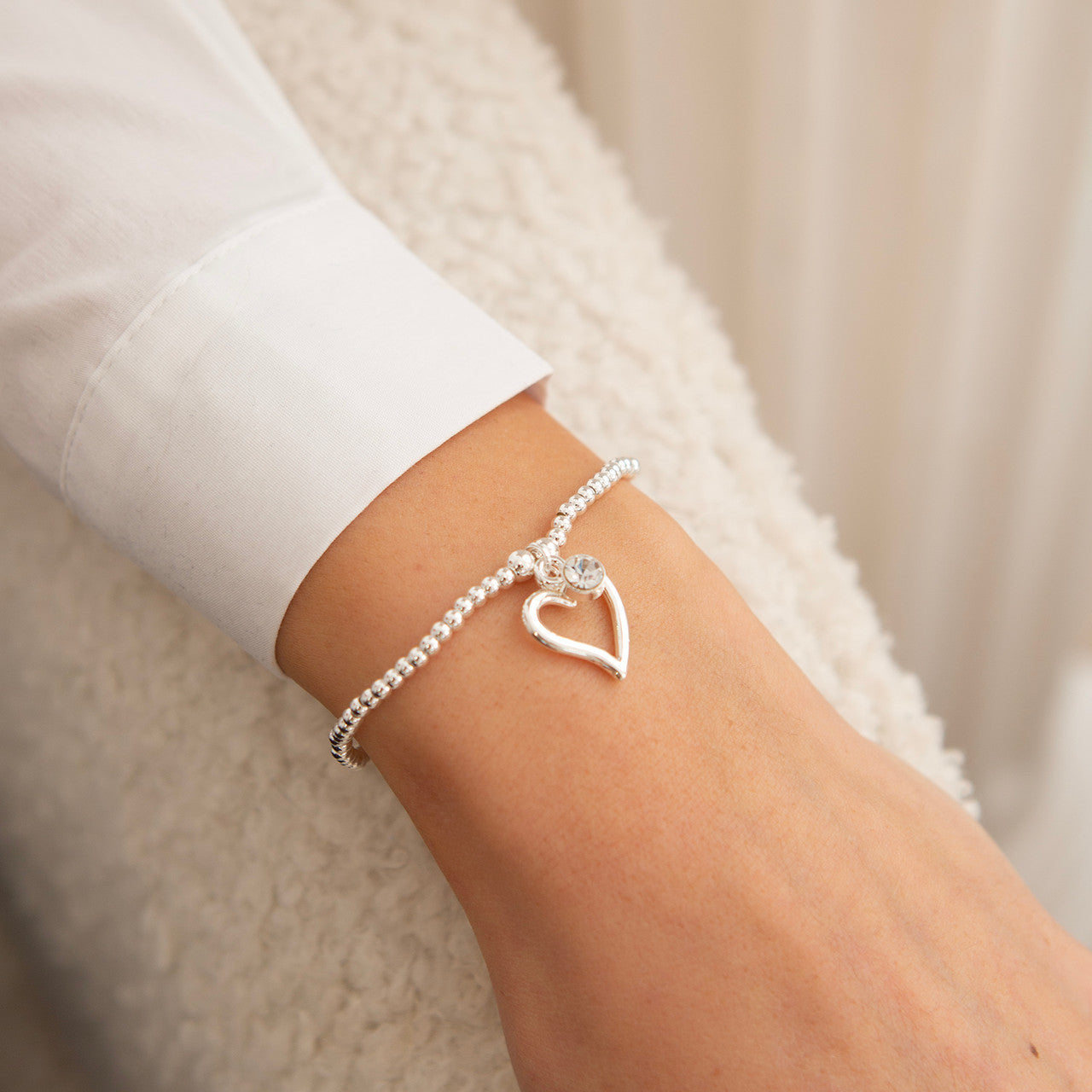 Open heart bracelet in silver