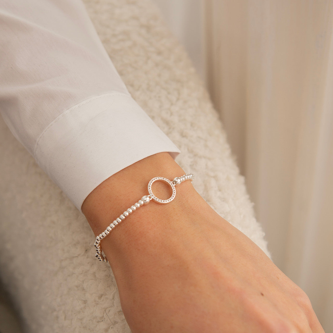 Open crystal circle bracelet in silver