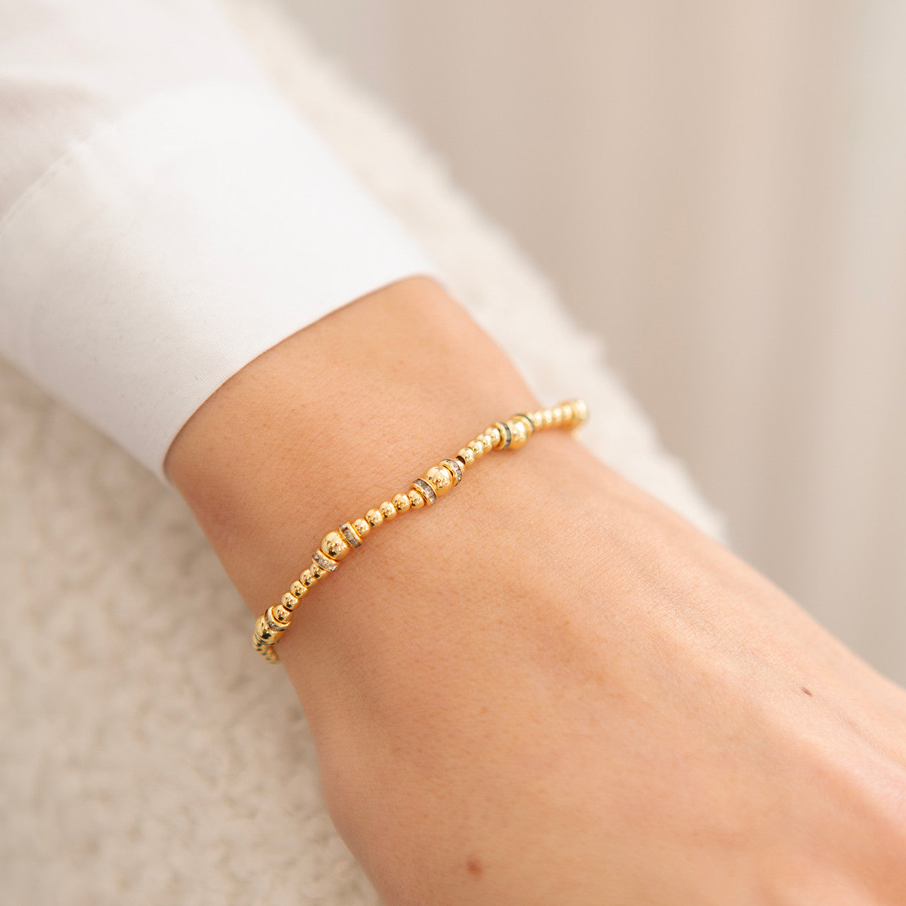 Dazziling rhinestone rondelles bracelet in gold