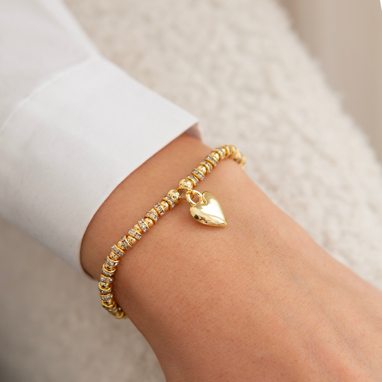 Polished big puffed heart bracelet in gold