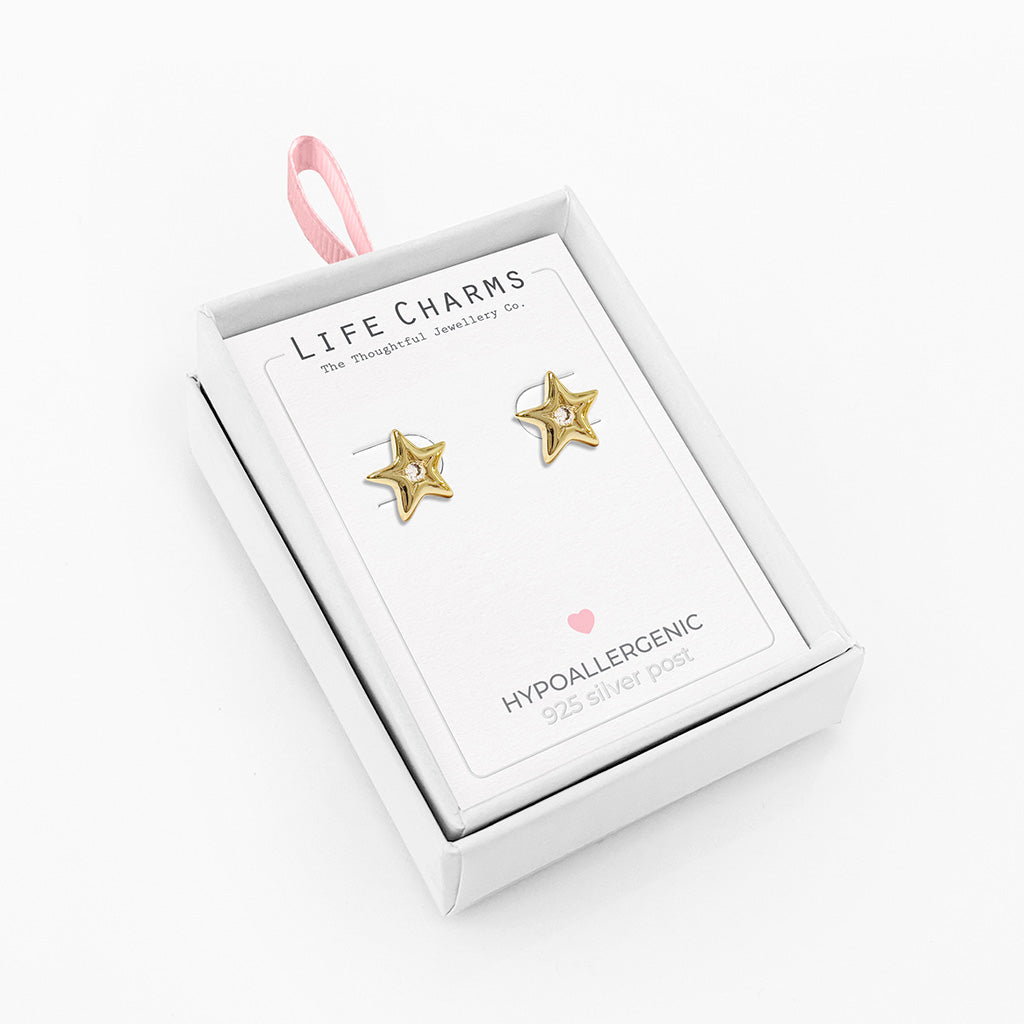 Gold sparkling dainty star studs