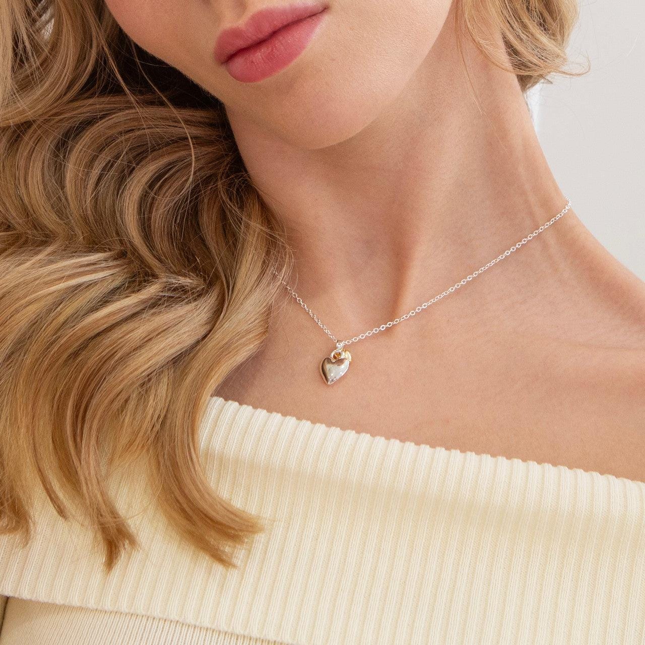 Silver and gold puffed hearts pendant necklace