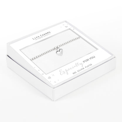 Polished puffed heart bracelet in silver