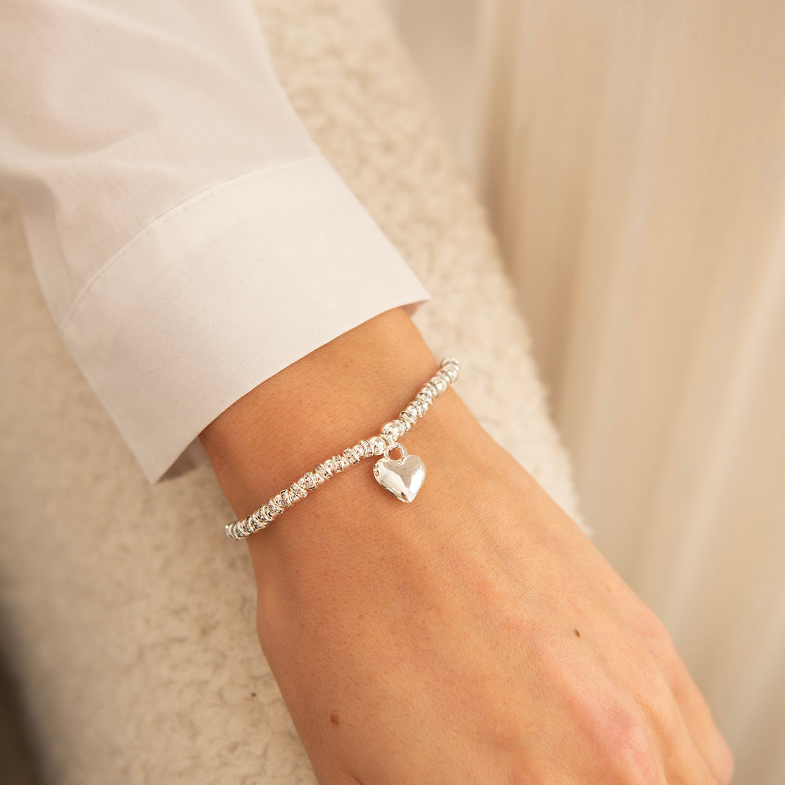 Polished big puffed heart bracelet in silver