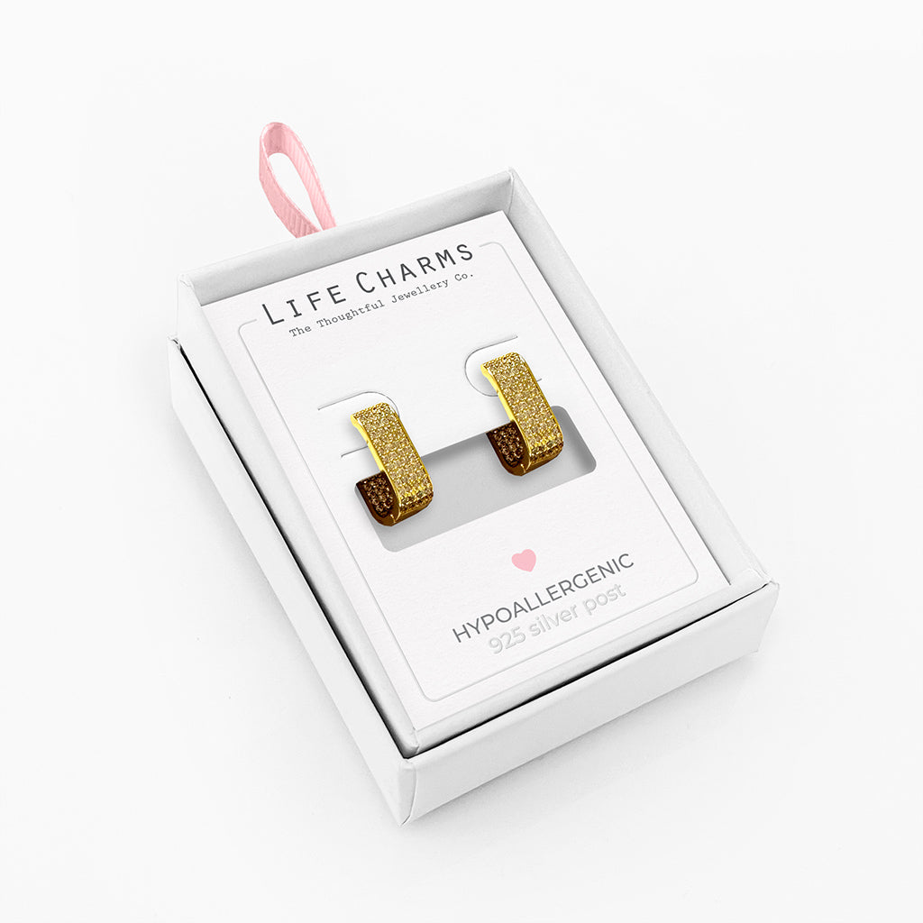 Sparkling rectangle huggie earrings in gold