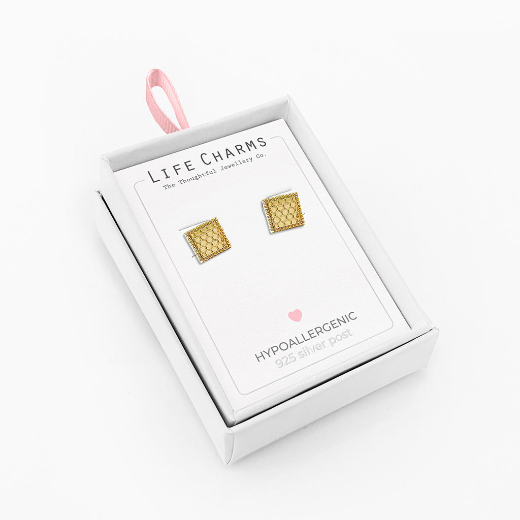 Honeycomb square studs in gold