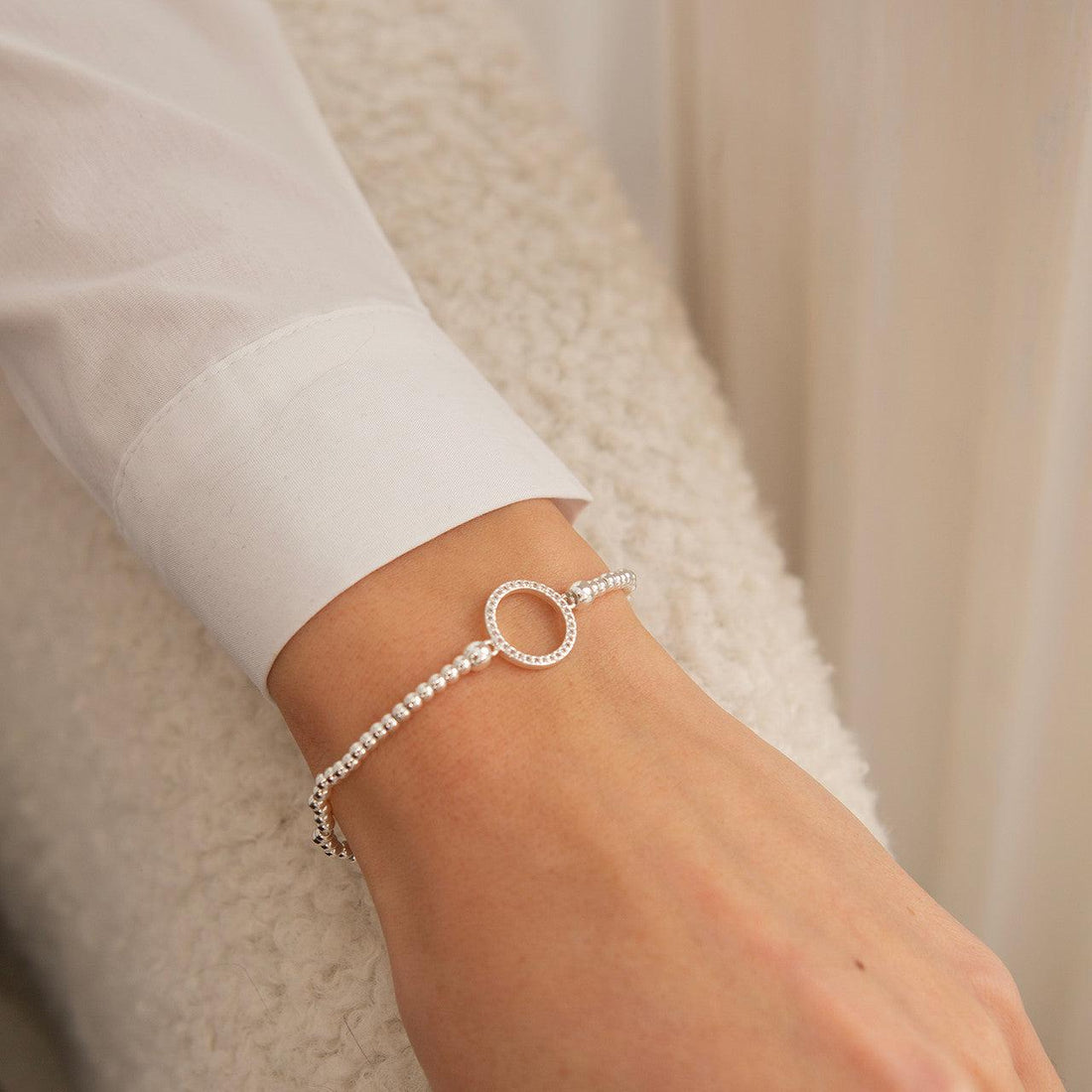 Open crystal circle bracelet in silver