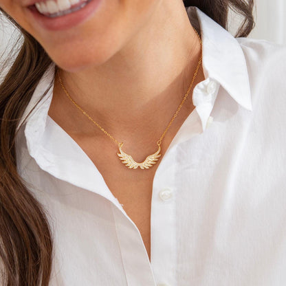 Zirconia studded angel wings pendant necklace in gold