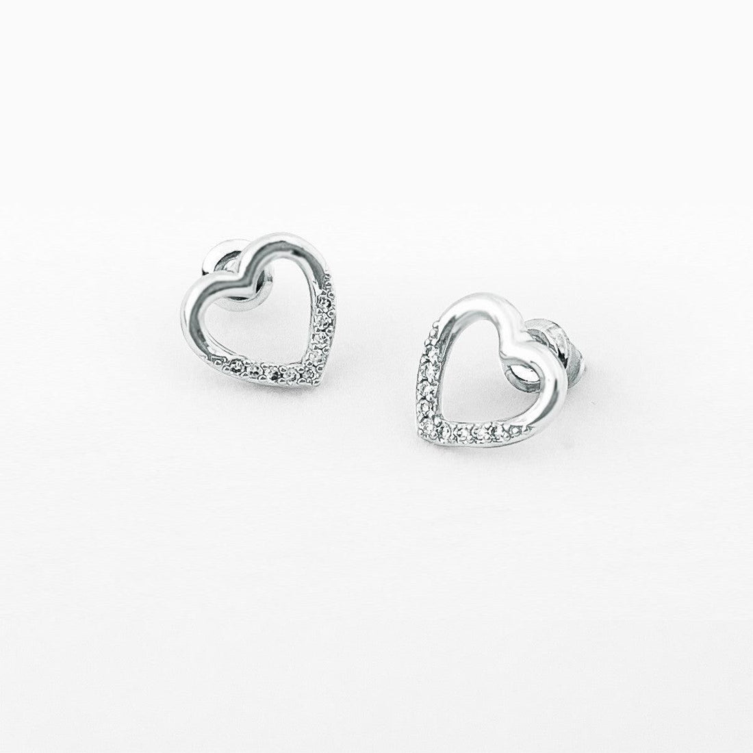 Open silver heart stud earrings